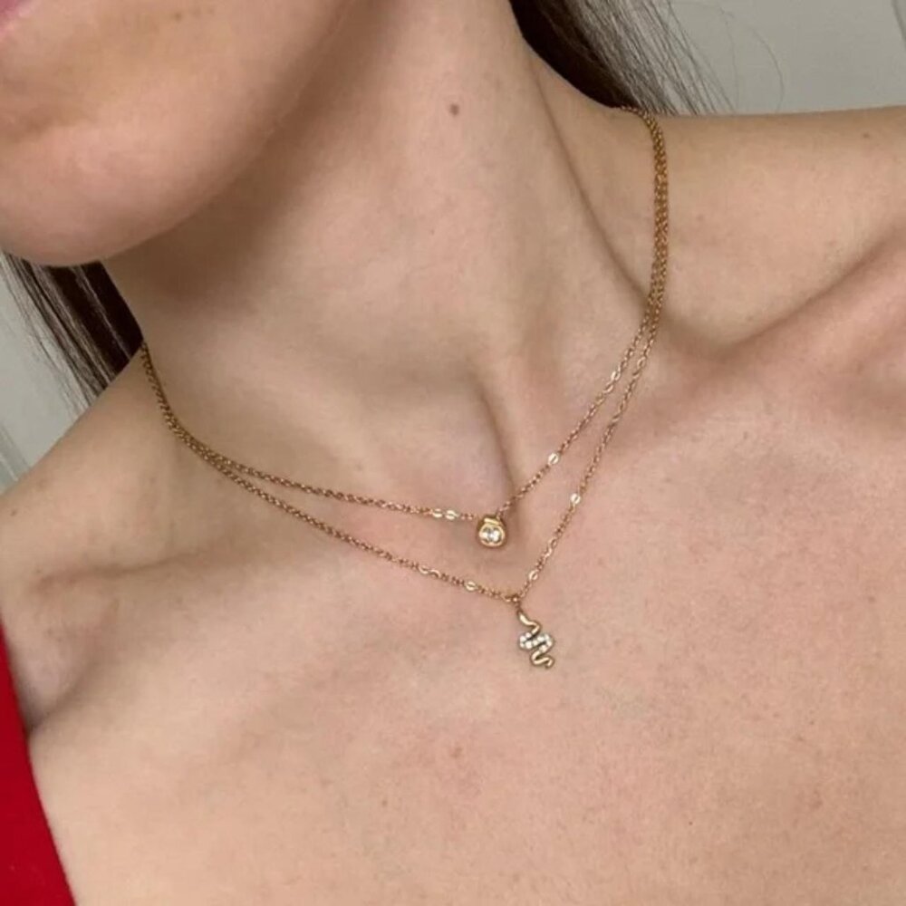 The Arielle Gold stainless steel necklace with cz stones snake shape dainty